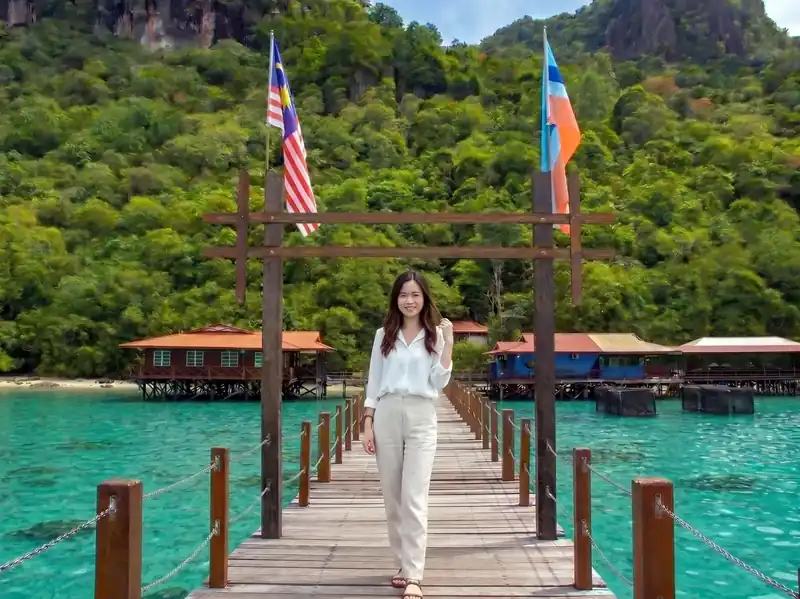 Hiking Bohey Dulang for panoramic lagoon views with Tampi Tampi Resort in the Semporna Islands area