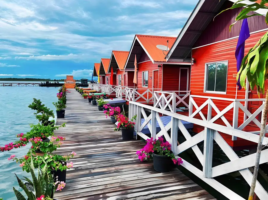 Exterior view of the overwater bungalow accommodations Tampi Tampi Resort